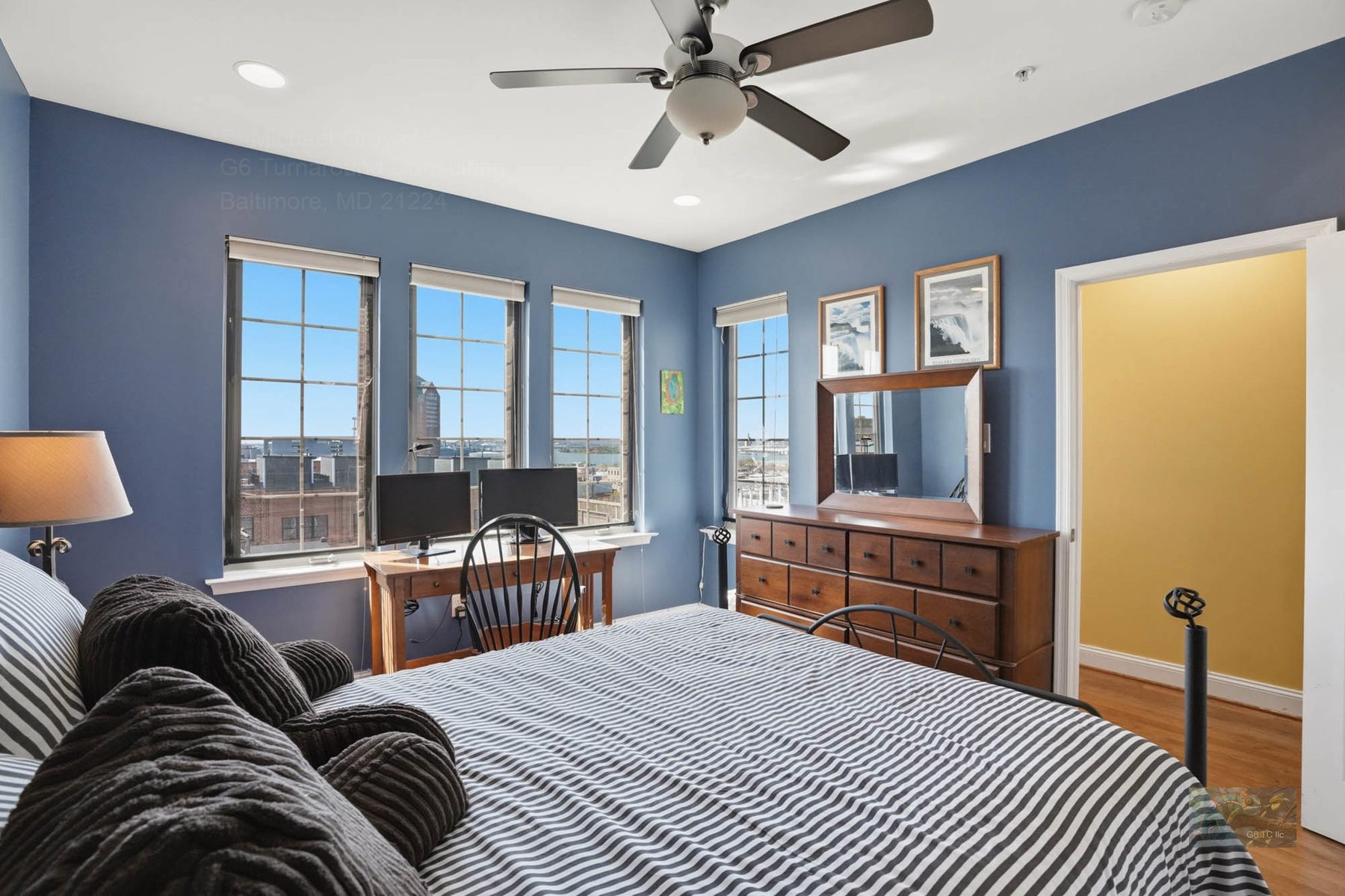 Upper bedroom with queen bed and view